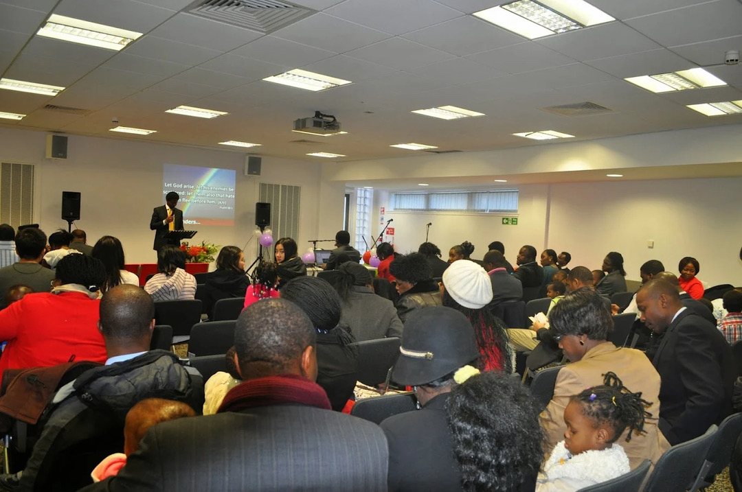 The City of Joy congregation in worship